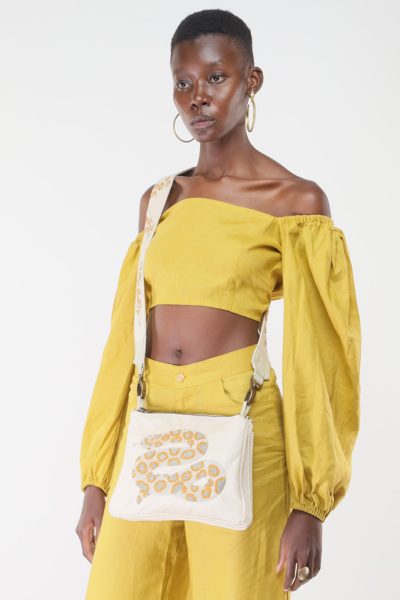 white snake with yellow beadwork